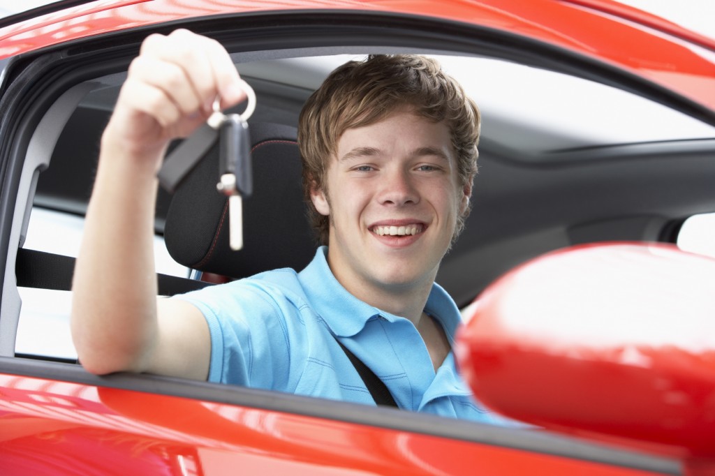 Man holding keys for driving